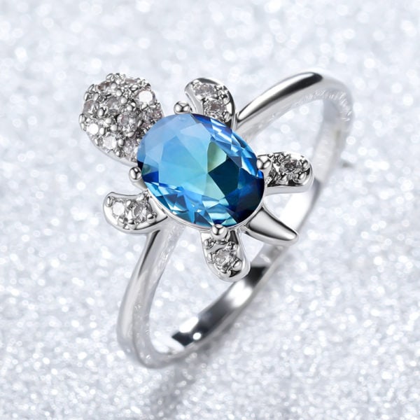 Bague Tortue en or blanc et diamant bleu – Image 3